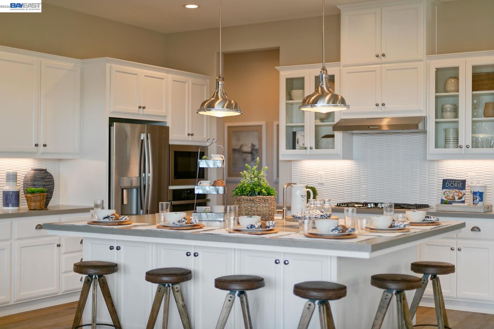 927 Conrad Street Manteca, CA 95336 - Photo 35 of 42 a kitchen with stainless steel appliances a sink and cabinets