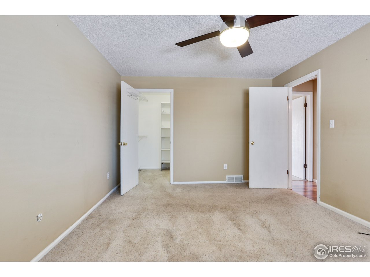 2208 Antelope Road Fort Collins, CO 80525 - Photo 6 of 16 Master bedroom walk in closet