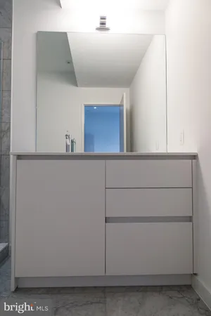 a utility room with cabinets