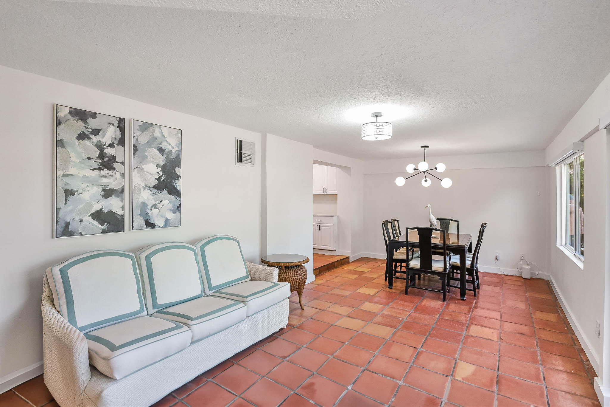 103 East Shannondale Road Cloud Lake, FL 33406 - Photo 12 of 31 a view of a dining room with furniture and chandelier