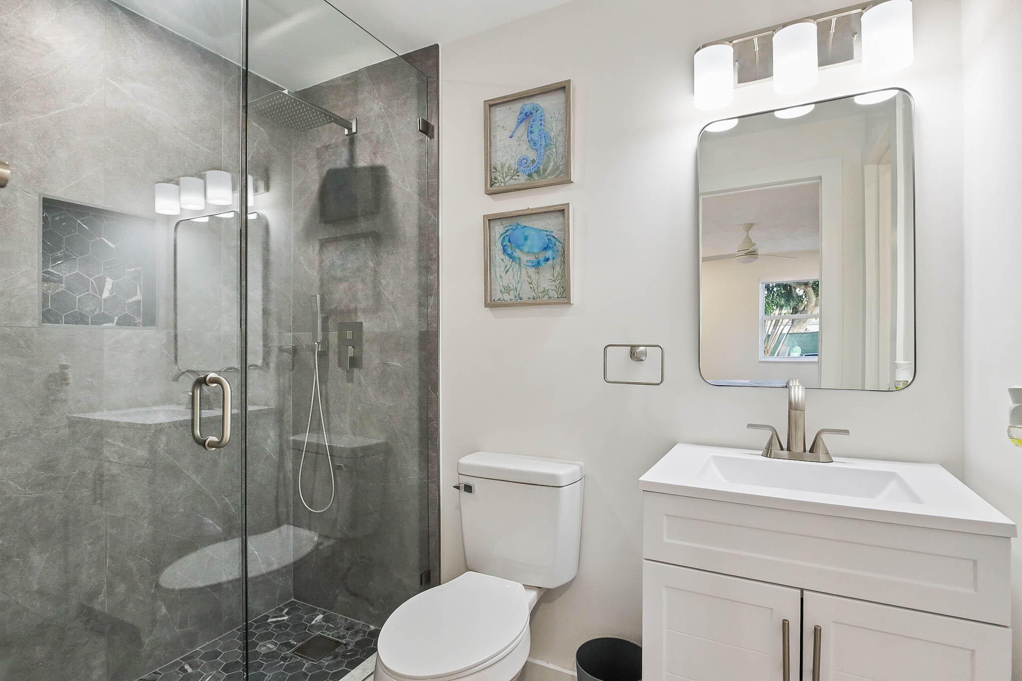 103 East Shannondale Road Cloud Lake, FL 33406 - Photo 18 of 31 a bathroom with a sink toilet and shower