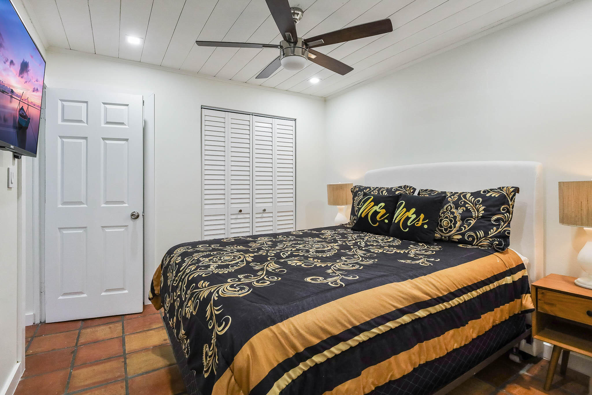 103 East Shannondale Road Cloud Lake, FL 33406 - Photo 20 of 31 a bedroom with a bed and a window