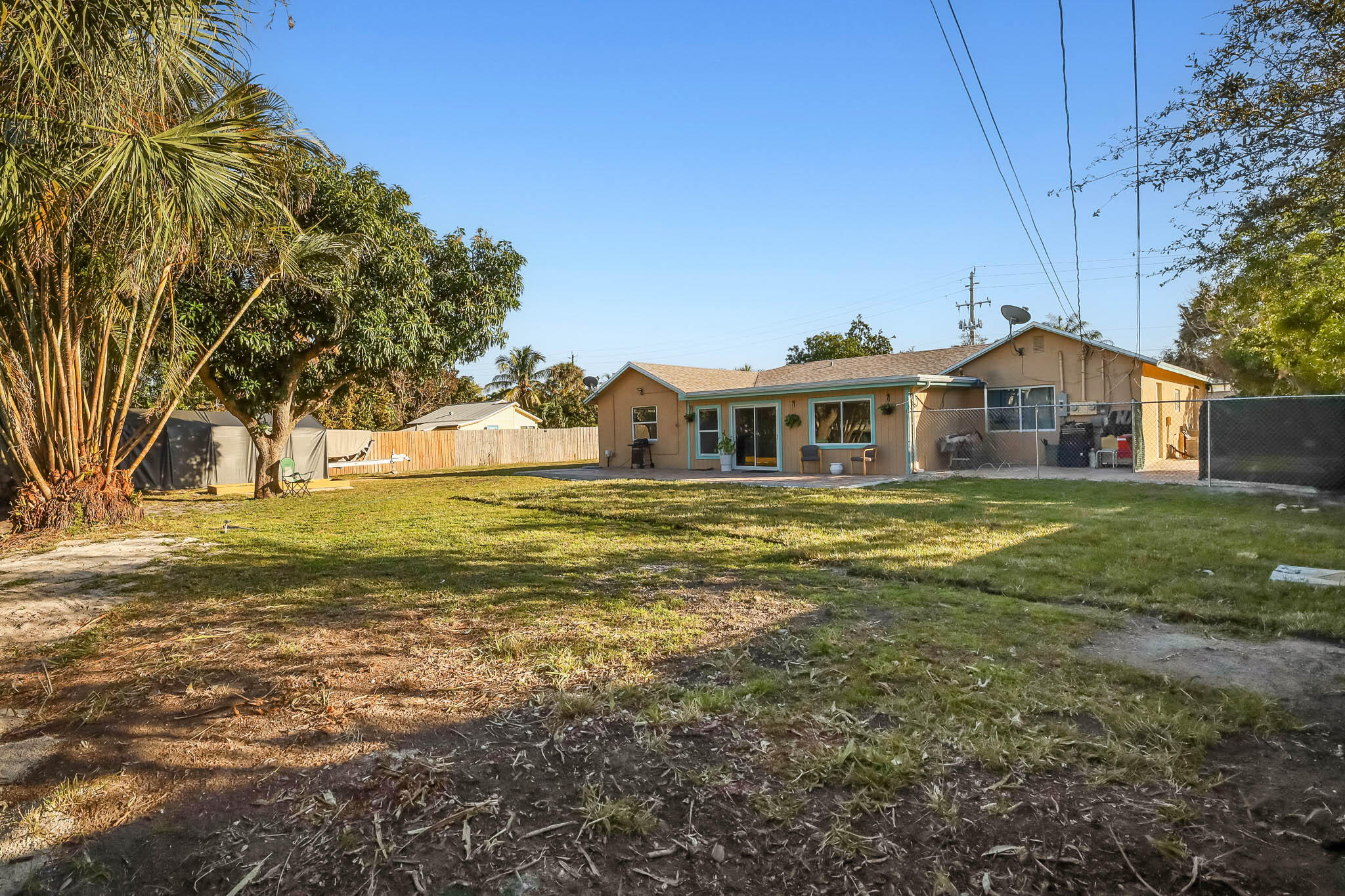 103 East Shannondale Road Cloud Lake, FL 33406 - Photo 29 of 31 a front view of house with yard