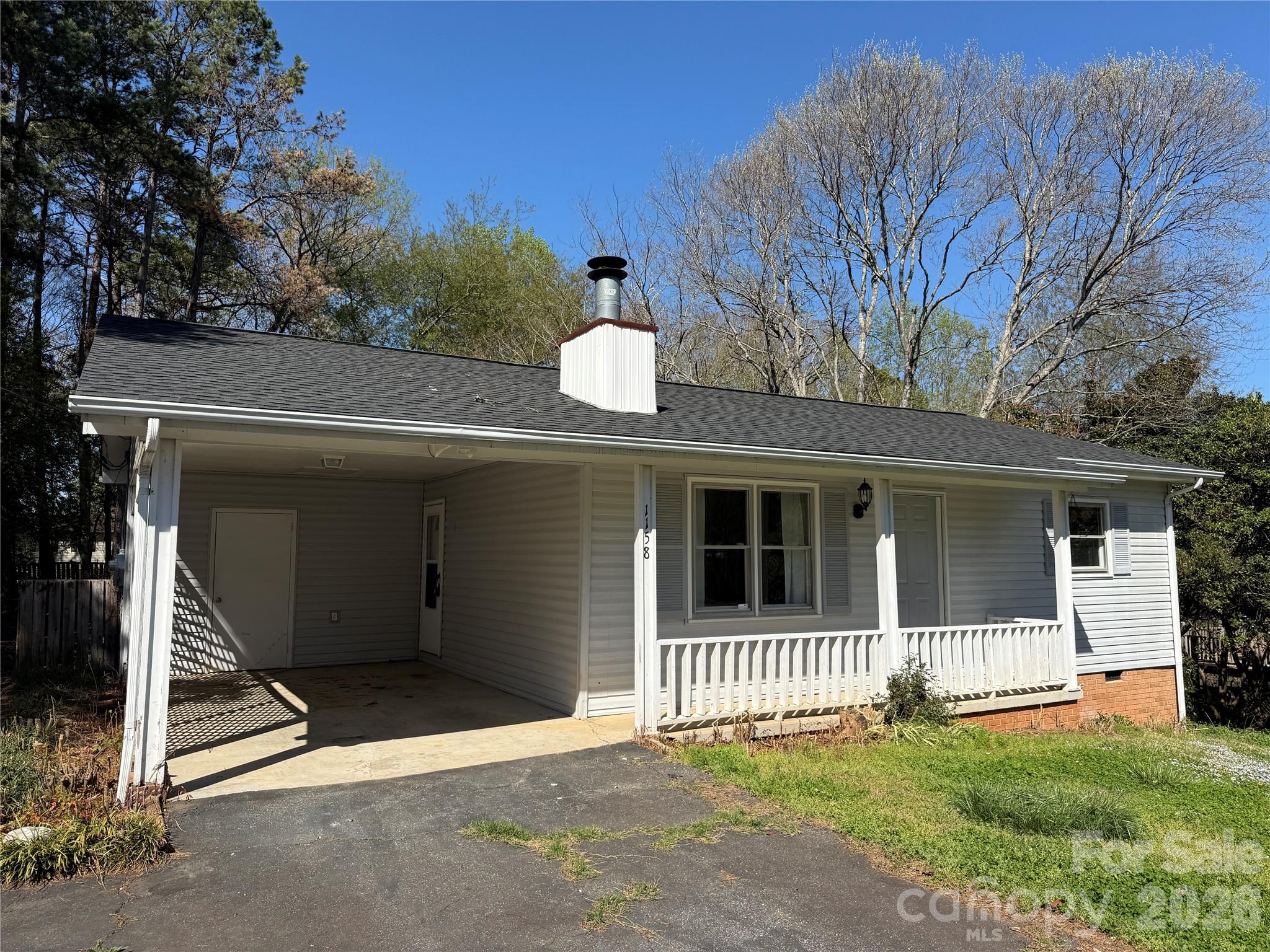 1158 Sunset Court Conover, NC 28613 - Photo 2 of 31 a view of a house with a large window and yard