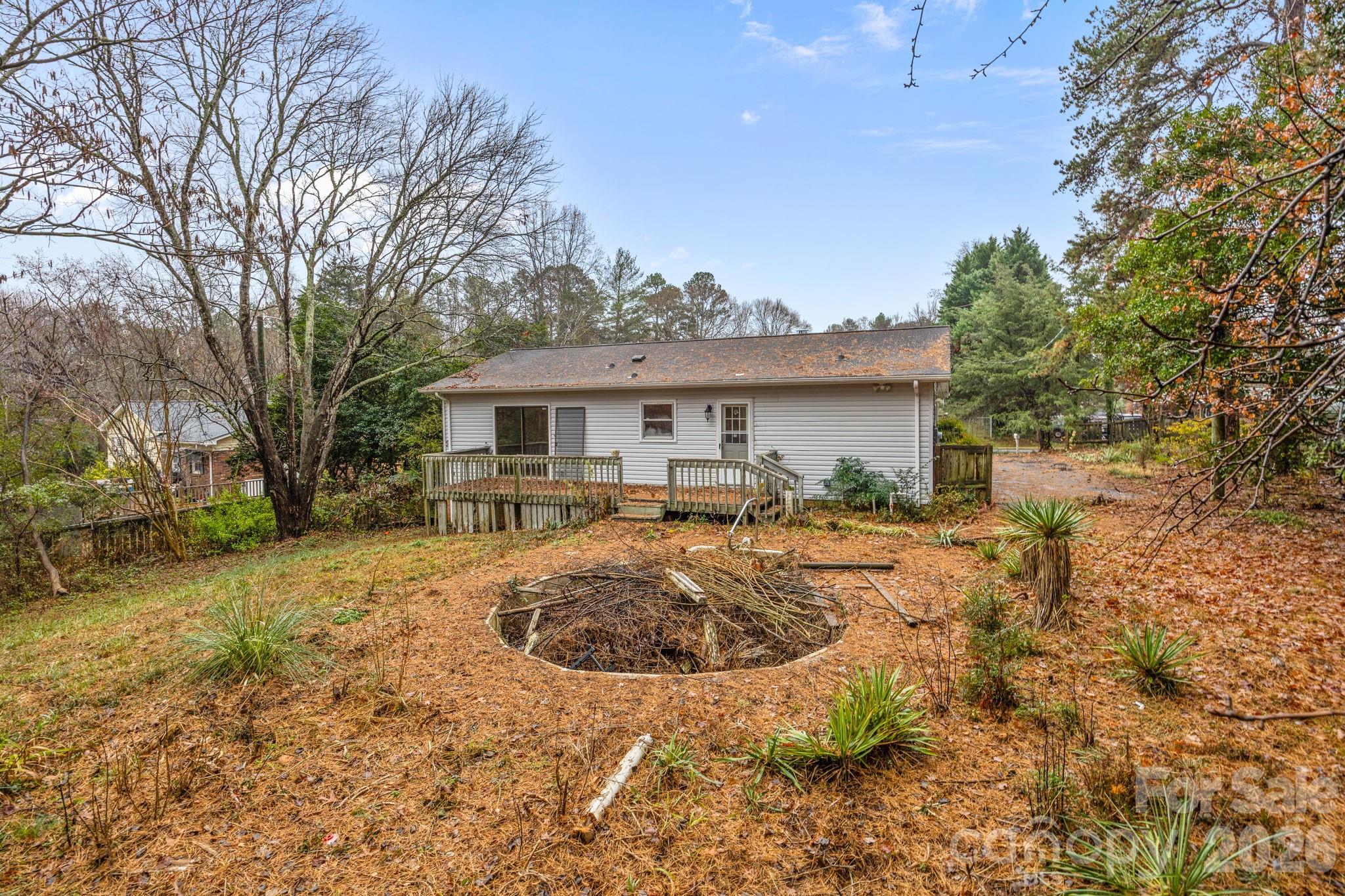 1158 Sunset Court Conover, NC 28613 - Photo 21 of 31 a view of a house with backyard and sitting area
