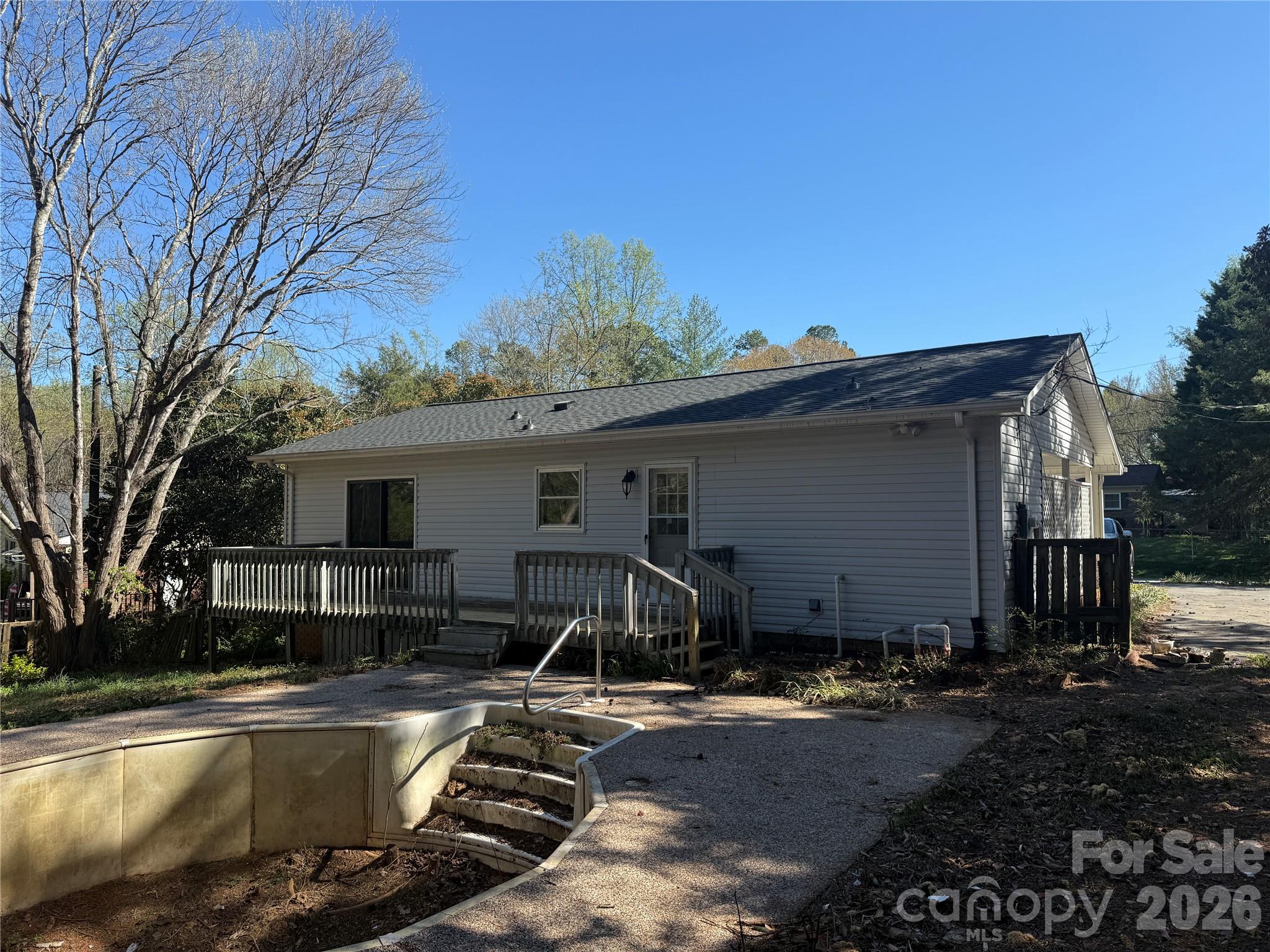 1158 Sunset Court Conover, NC 28613 - Photo 22 of 31 a view of a house with pool and chairs