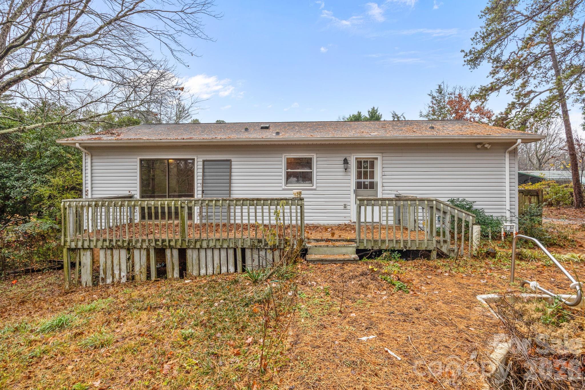 1158 Sunset Court Conover, NC 28613 - Photo 26 of 31 a view of a house with a wooden fence