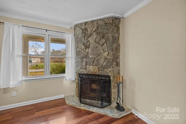 a kitchen with granite countertop stainless steel appliances granite countertop a sink and a window