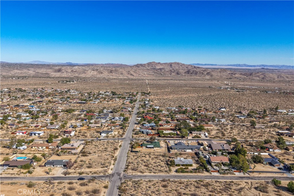 7505 Sherwood Road Joshua Tree, CA 92252 - Photo 3 of 12 a view of a city with ocean view