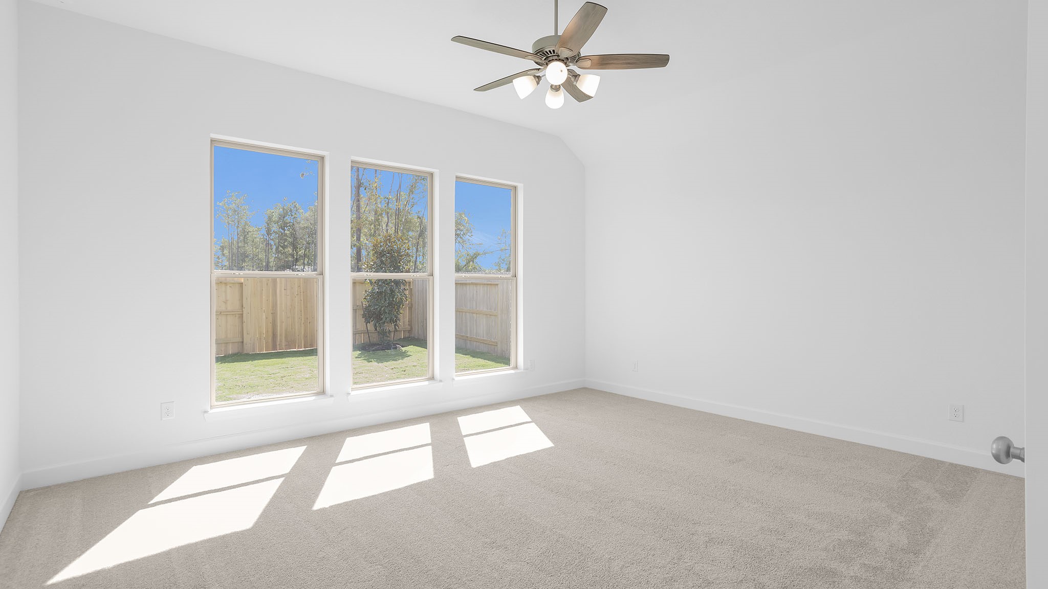 18222 Upper Brook Street Conroe, TX 77302 - Photo 6 of 26 an empty room with a window