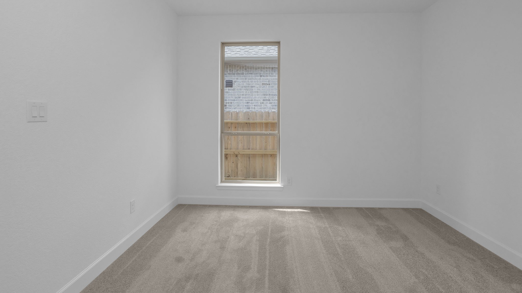 18222 Upper Brook Street Conroe, TX 77302 - Photo 10 of 26 an empty room with a window