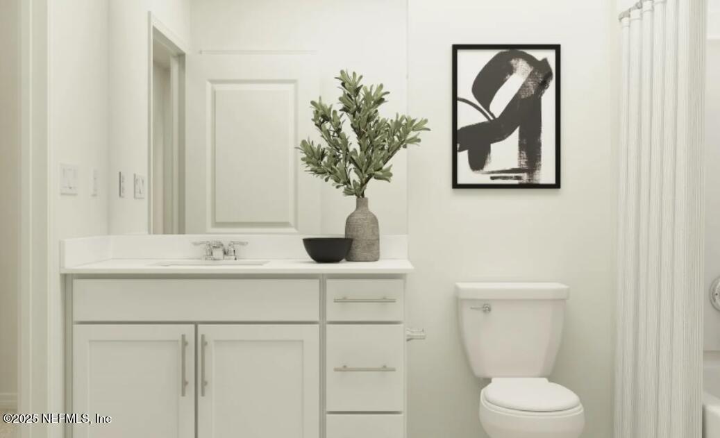 41 Powder Horn Drive Palm Coast, FL 32164 - Photo 11 of 15 a bathroom with a toilet a sink and mirror