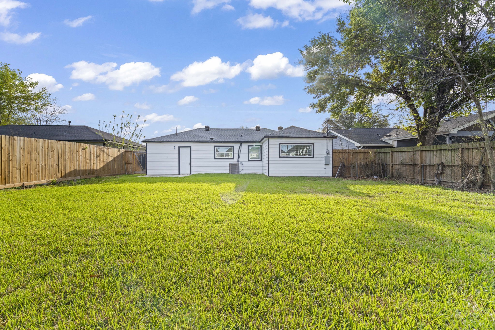 10602 Buffum Street Houston, TX 77051 - Photo 2 of 10 a view of a house with a large pool