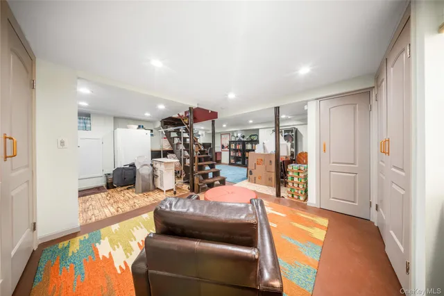 a living room with furniture and a table