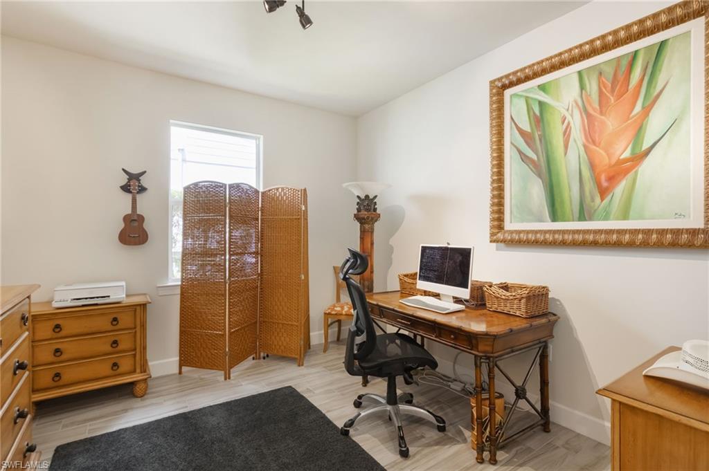 43007 Parkside Court Punta Gorda, FL 33982 - Photo 14 of 44 a view of a workspace with furniture and a window