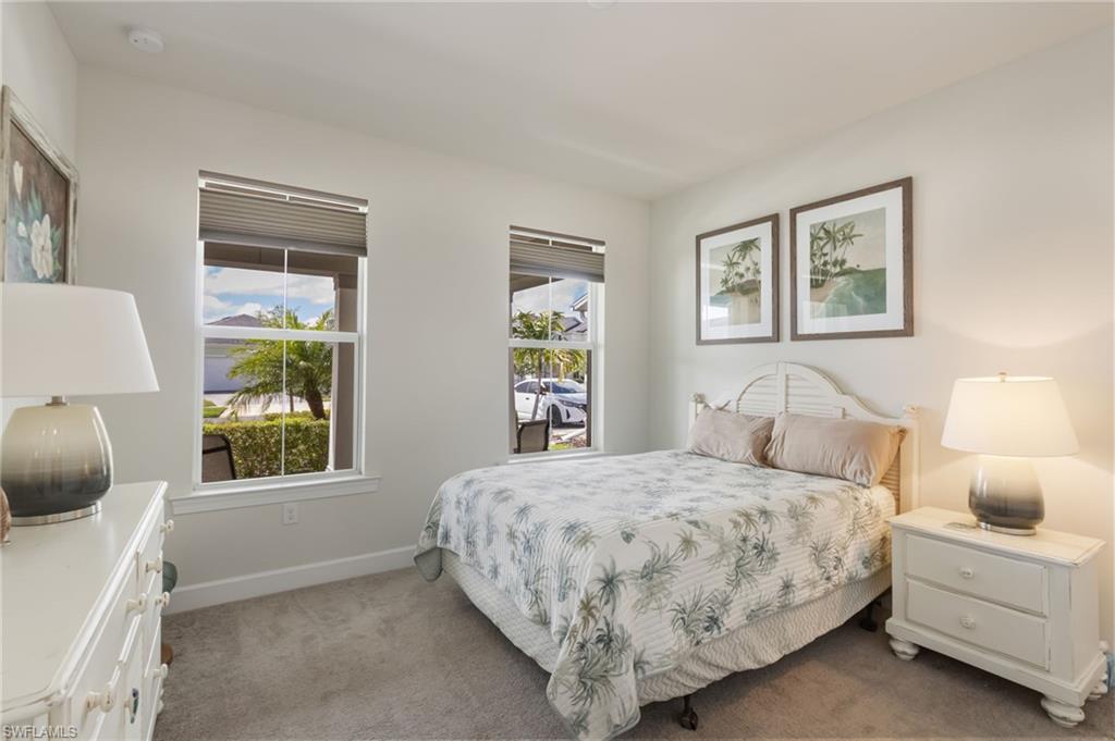 43007 Parkside Court Punta Gorda, FL 33982 - Photo 19 of 44 a bedroom with a bed and a window