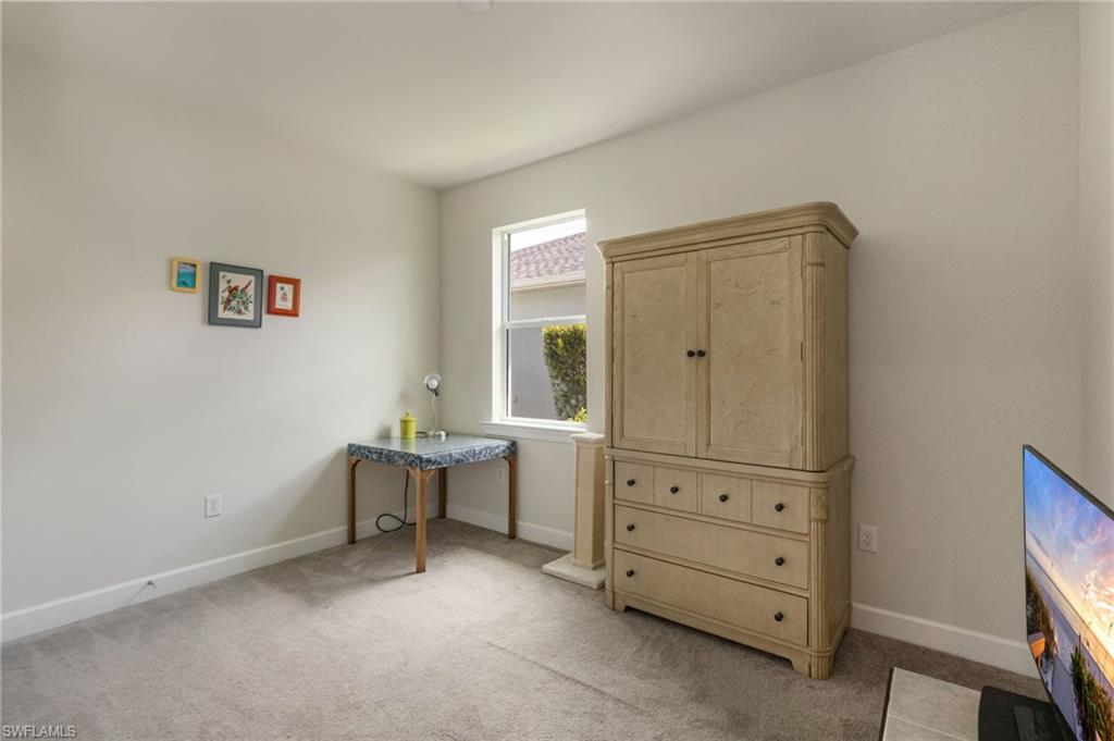 43007 Parkside Court Punta Gorda, FL 33982 - Photo 22 of 44 a room with a desk and a window