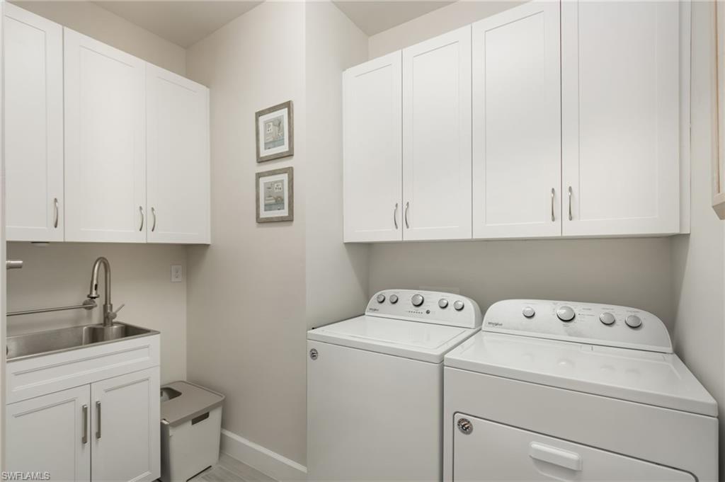43007 Parkside Court Punta Gorda, FL 33982 - Photo 23 of 44 a view of storage and utility room with washer and dryer