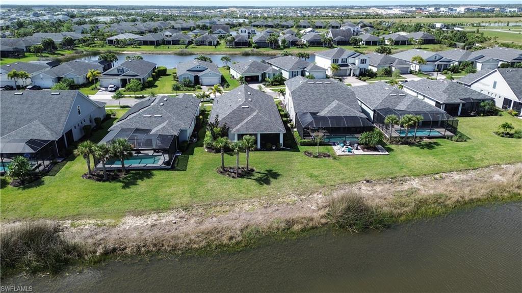 43007 Parkside Court Punta Gorda, FL 33982 - Photo 32 of 44 an aerial view of houses with yard