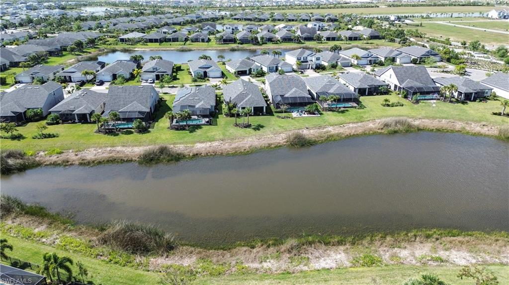 43007 Parkside Court Punta Gorda, FL 33982 - Photo 33 of 44 an aerial view of residential houses with outdoor space and lake view