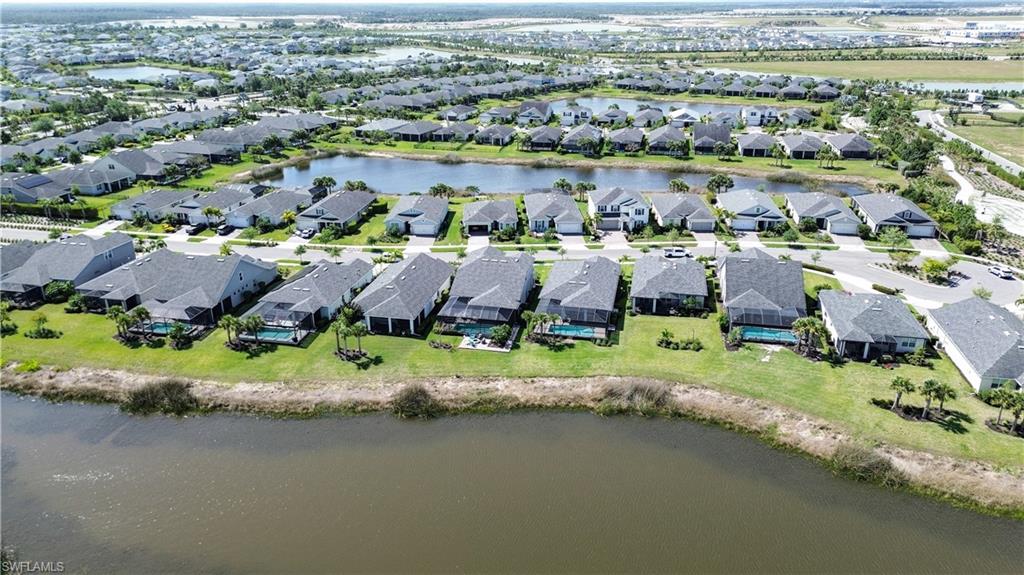 43007 Parkside Court Punta Gorda, FL 33982 - Photo 34 of 44 an aerial view of residential houses with outdoor space and lake view