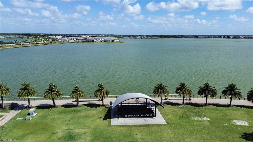 43007 Parkside Court Punta Gorda, FL 33982 - Photo 41 of 44 a view of a lake with a yard