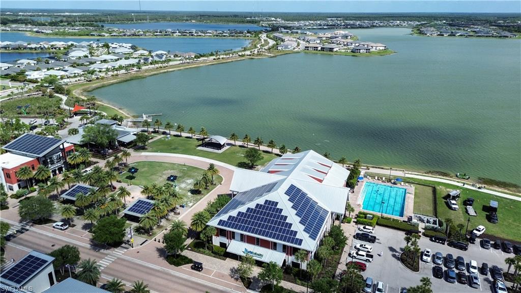 43007 Parkside Court Punta Gorda, FL 33982 - Photo 43 of 44 an aerial view of a city with lots of residential buildings ocean and mountain view