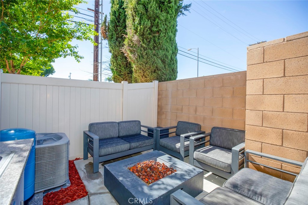 8656 Winnetka Avenue Winnetka, CA 91306 - Photo 23 of 31 a outdoor living space with furniture and a potted plant