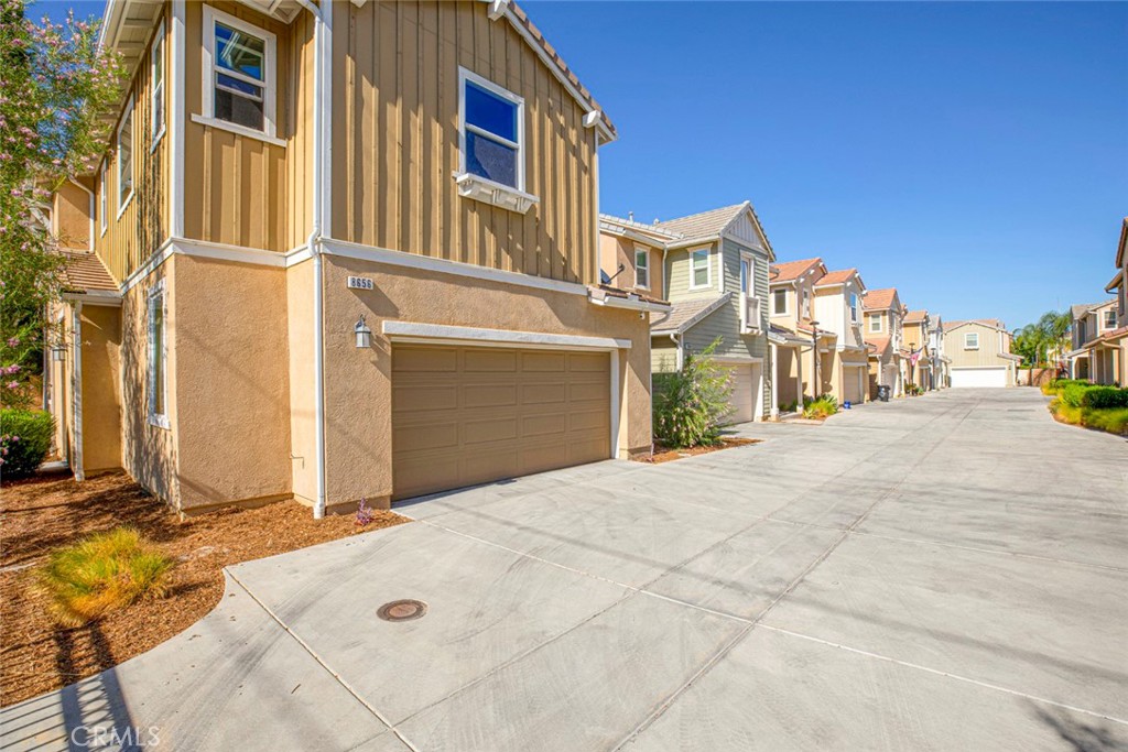 8656 Winnetka Avenue Winnetka, CA 91306 - Photo 30 of 31 a front view of a house with a yard