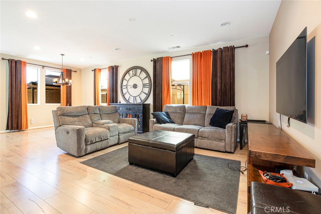 8656 Winnetka Avenue Winnetka, CA 91306 - Photo 4 of 31 a living room with furniture and a large window