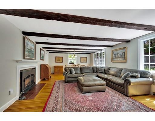 7 Ravine Road Winchester, MA 01890 - Photo 11 of 24 a living room with furniture and a fireplace