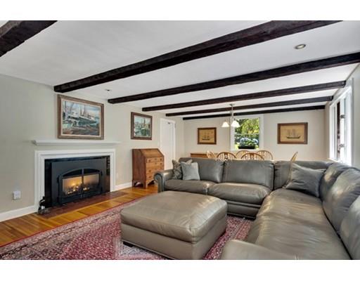 7 Ravine Road Winchester, MA 01890 - Photo 12 of 24 a living room with furniture and a fireplace