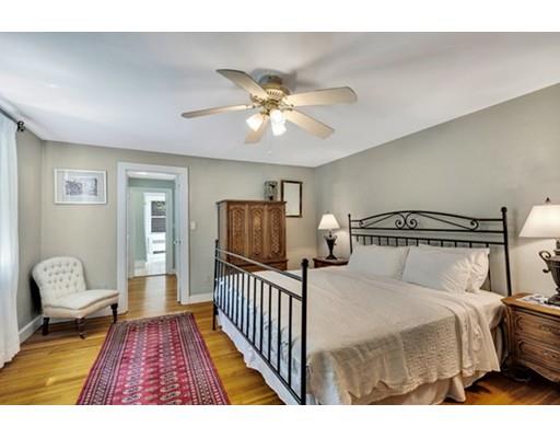 7 Ravine Road Winchester, MA 01890 - Photo 13 of 24 a bedroom with a bed and a couch