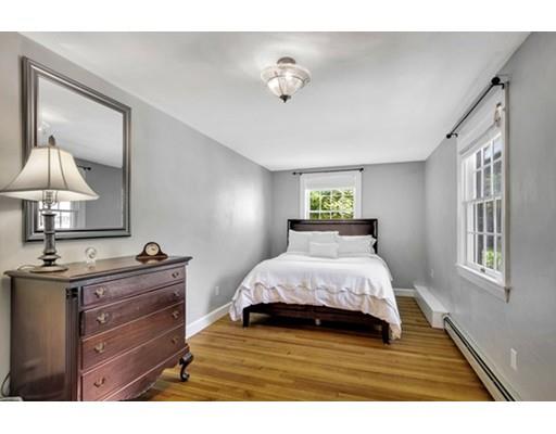 7 Ravine Road Winchester, MA 01890 - Photo 14 of 24 a bedroom with a bed and a dresser