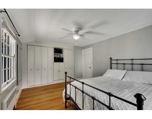 7 Ravine Road Winchester, MA 01890 - Photo 15 of 24 a living room with a bed furniture and a window