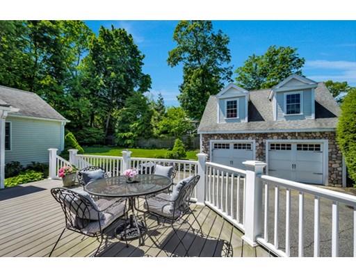 7 Ravine Road Winchester, MA 01890 - Photo 19 of 24 a view of a chairs and table on the deck