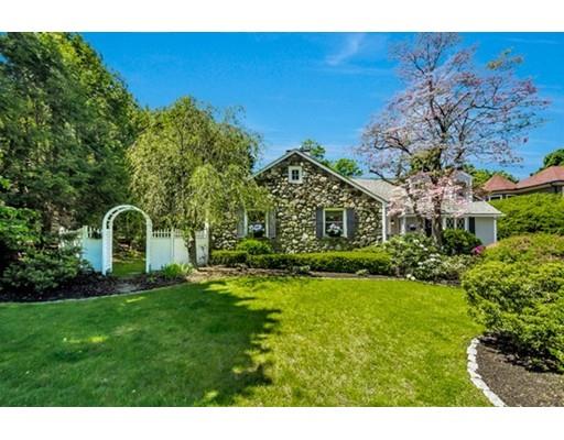 7 Ravine Road Winchester, MA 01890 - Photo 2 of 24 a front view of a house with a yard