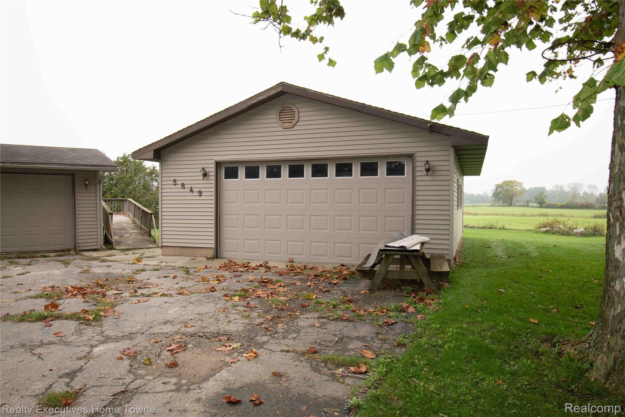 5849 Roach Road Croswell, MI 48422 - Photo 3 of 25 2nd Garage with electric garage door opener