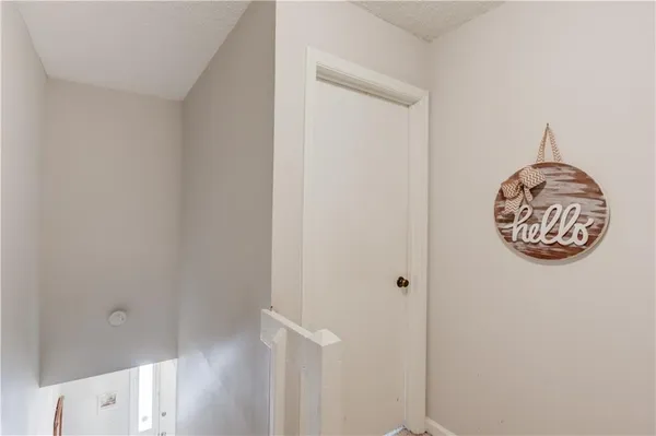 a bathroom with a mirror and a shower