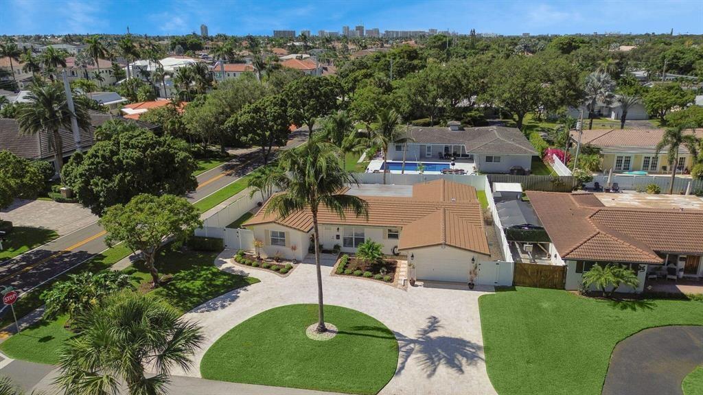 an aerial view of a house with a garden