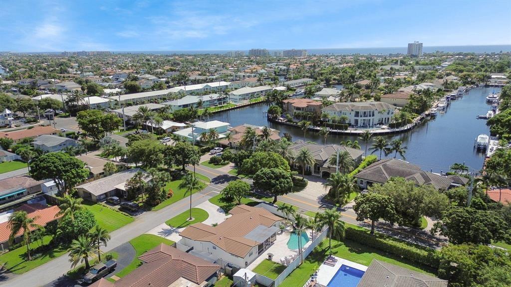 2250 Northeast 35th Street Lighthouse Point, FL 33064 - Photo 16 of 26 an aerial view of residential houses with outdoor space and river