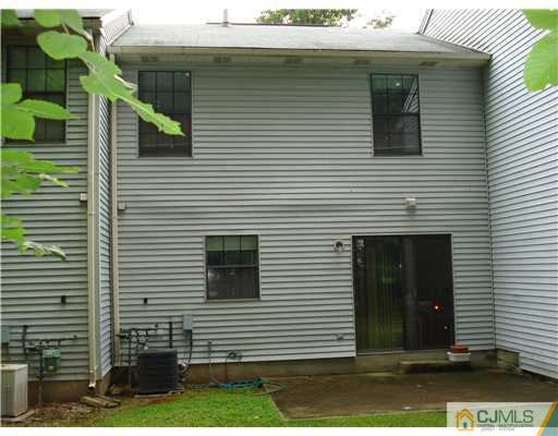604 Timber Oaks Road Edison, NJ 08820 - Photo 4 of 18 a view of a house with a yard