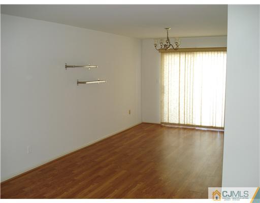 604 Timber Oaks Road Edison, NJ 08820 - Photo 9 of 18 a view of an empty room with a window