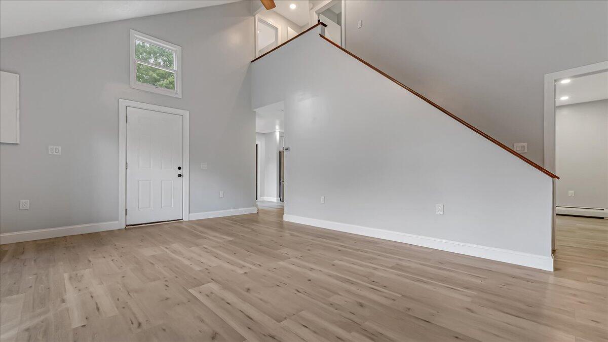 7198 Rimrock Drive Tobyhanna, PA 18466 - Photo 12 of 38 a view of an empty room with wooden floor