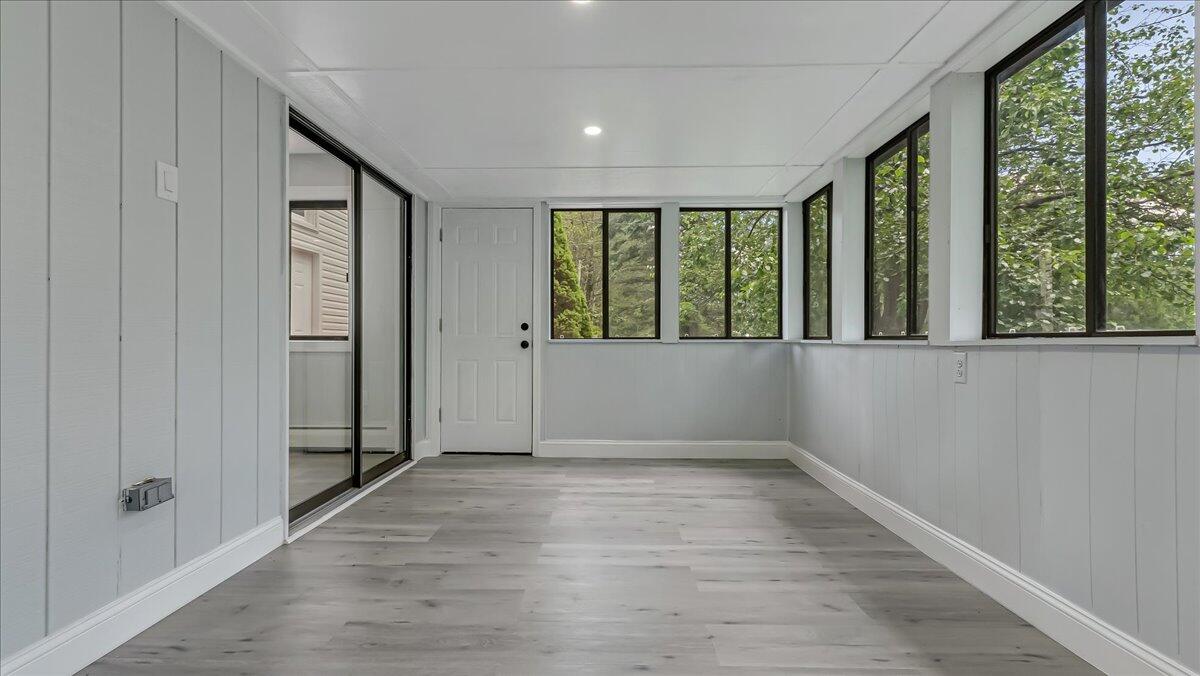 7198 Rimrock Drive Tobyhanna, PA 18466 - Photo 18 of 38 wooden floor in an empty room with a window