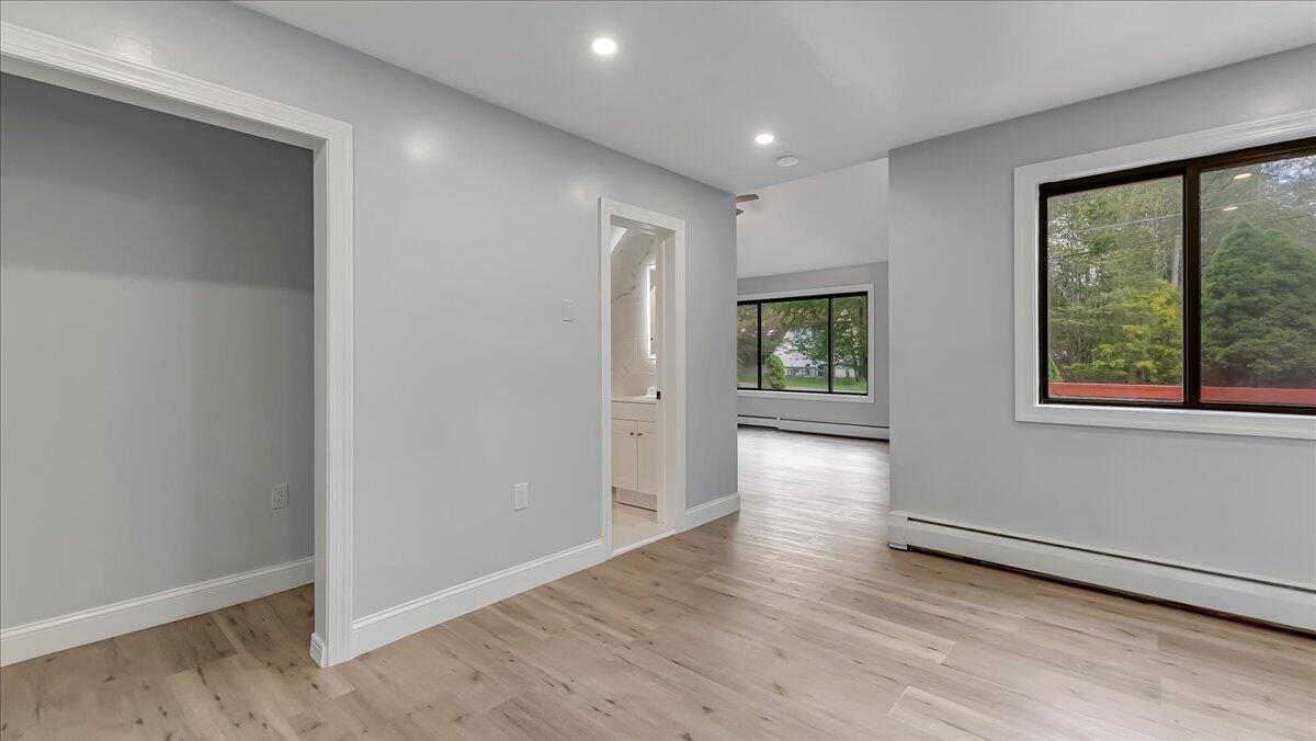 7198 Rimrock Drive Tobyhanna, PA 18466 - Photo 21 of 38 an empty room with wooden floor and windows