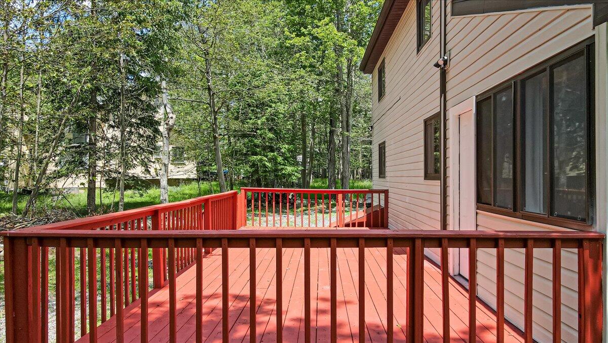 7198 Rimrock Drive Tobyhanna, PA 18466 - Photo 35 of 38 a balcony with trees in front of it