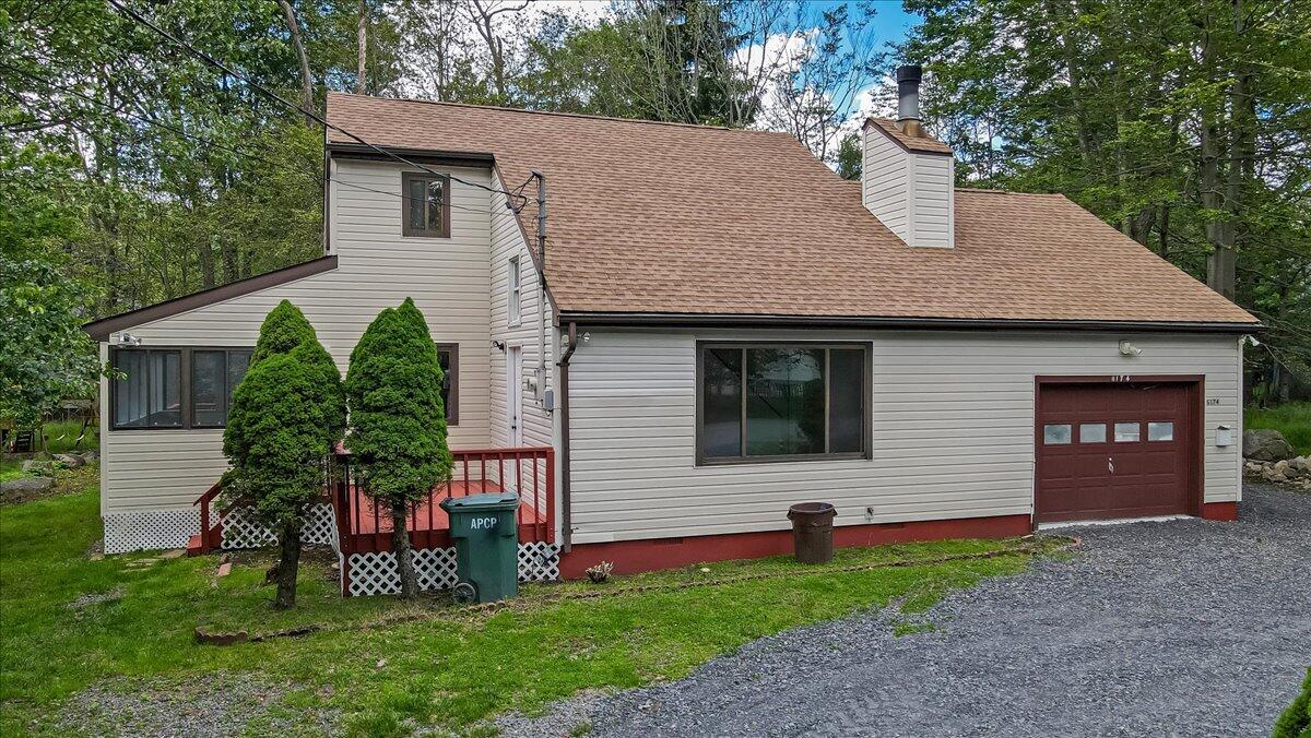 7198 Rimrock Drive Tobyhanna, PA 18466 - Photo 4 of 38 a house view with a garden space