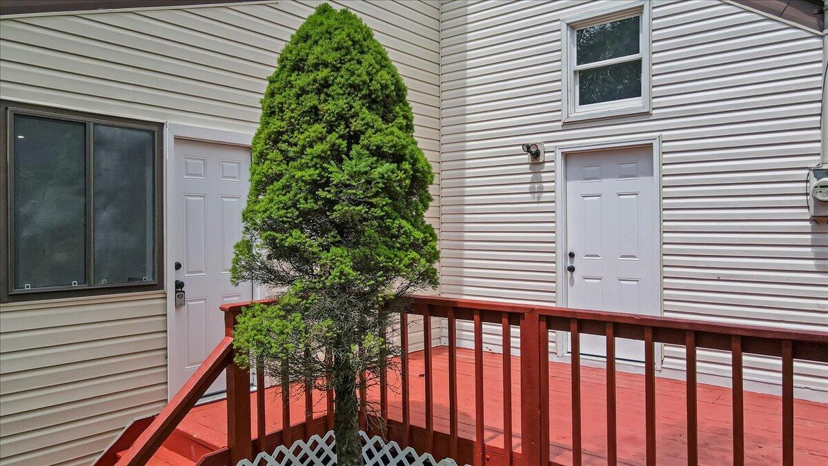 7198 Rimrock Drive Tobyhanna, PA 18466 - Photo 6 of 38 a view of a porch with a door