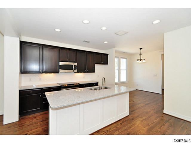 3486 Richard's Crossing Fort Mill, SC 29708 - Photo 10 of 16 a kitchen with stainless steel appliances a sink stove and refrigerator